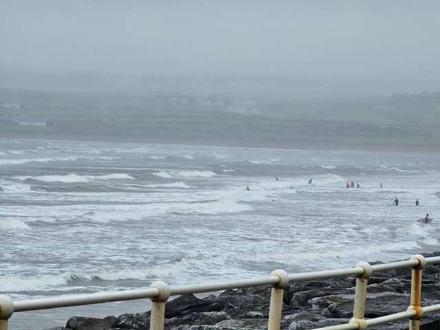 blown out wind swell with plenty of beginners in the water